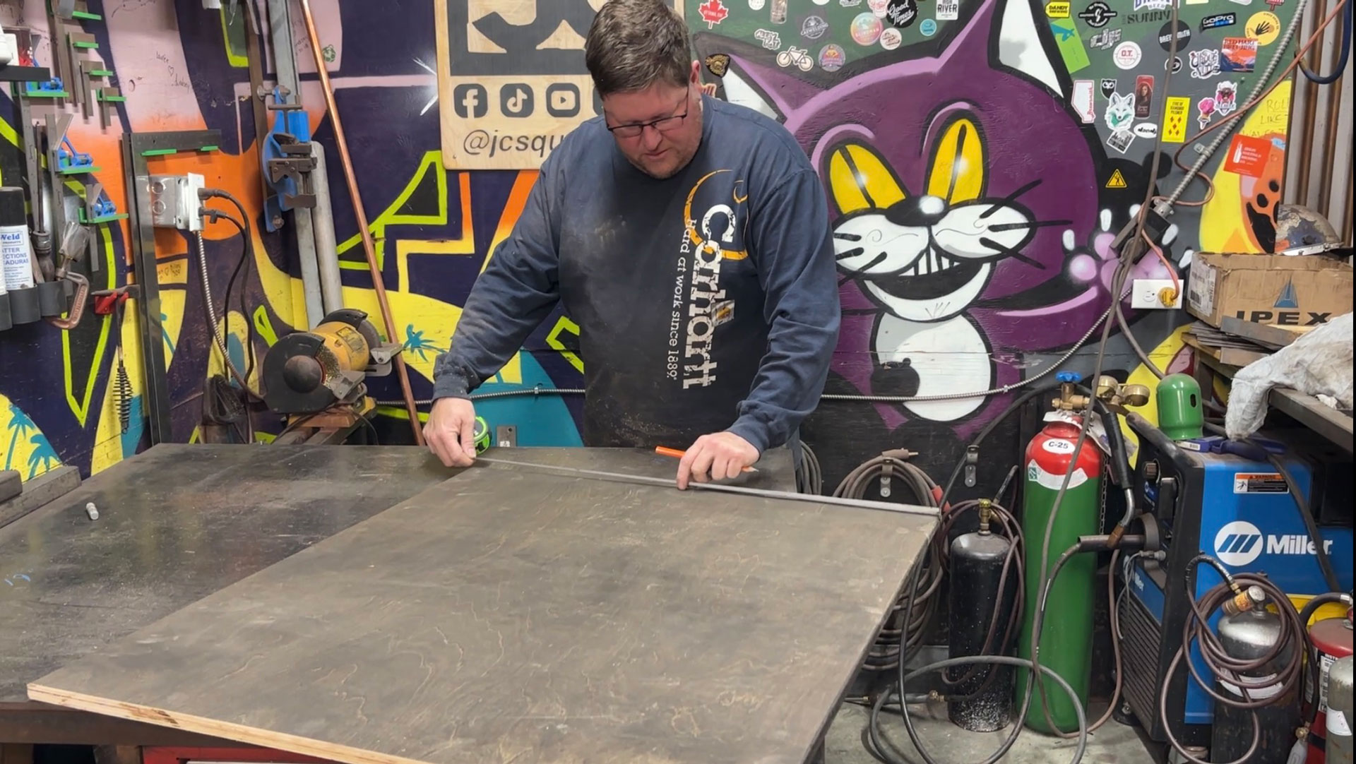 Maker working at a metal fabrication table
